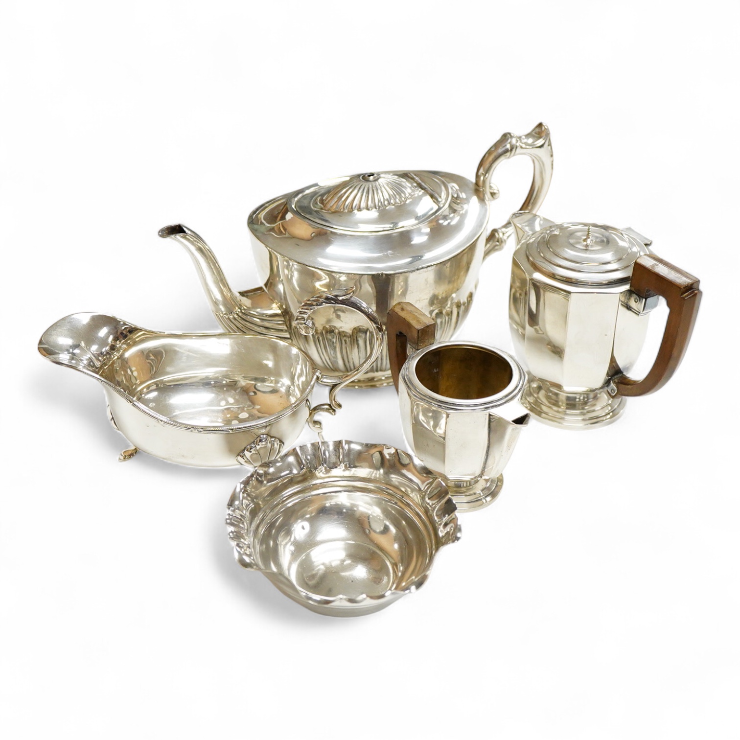 A 20th century continental 800 standard white metal hot water pot and cream jug (lacking cover and knop), gross weight 11.2oz, together with a plated teapot, sauceboat and bowl.
